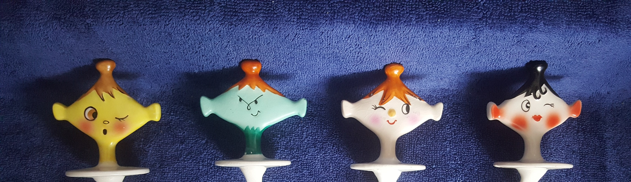 Four Holt Howard Pixieware faces