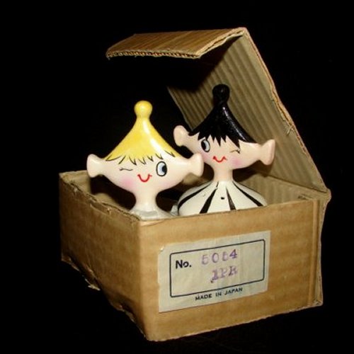 Salty and Peppy shakers peeking out of original cardboard box