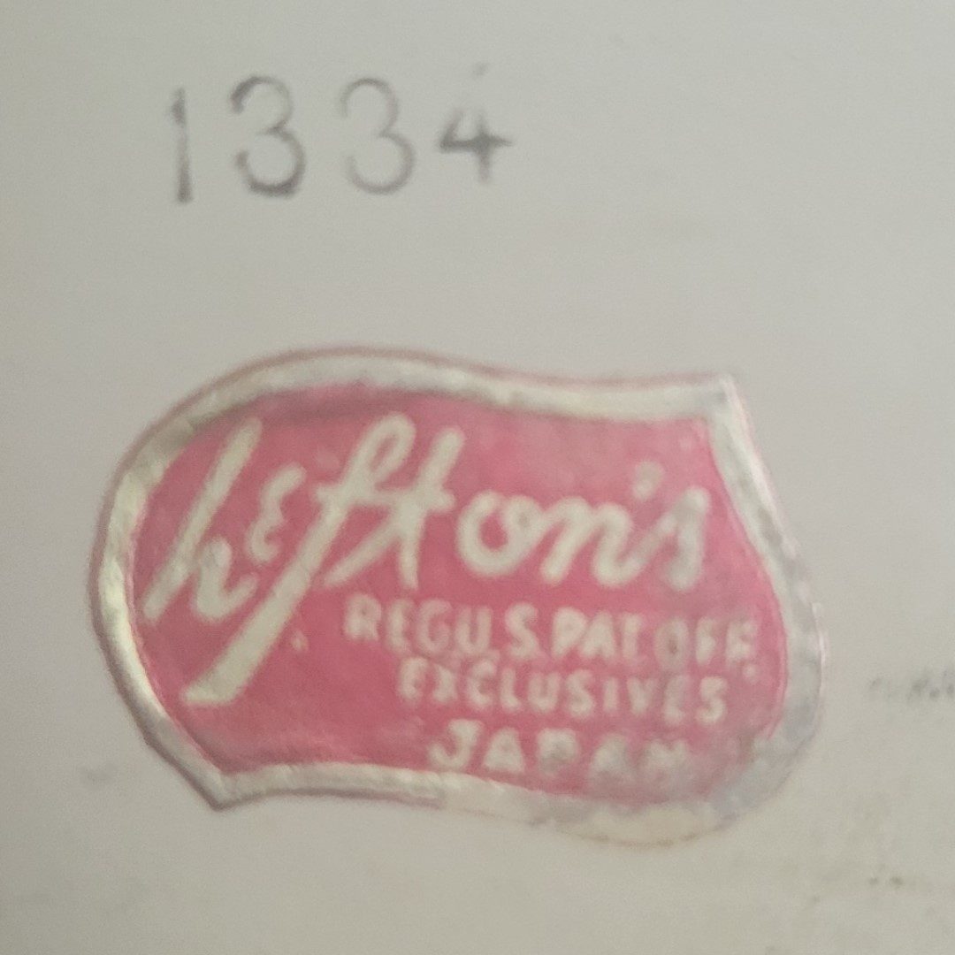 Lefton foil label and black catalog-number stamp.