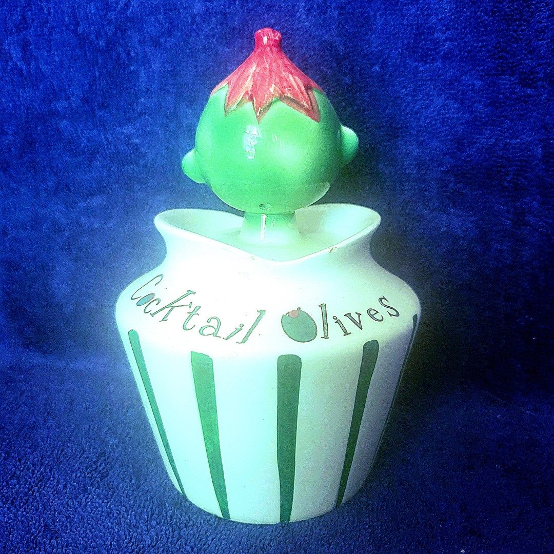 Full-sized Cocktail Olives, reverse side with seven vertical stripes.