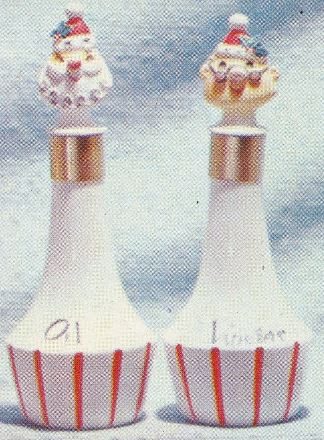 Catalog crop showing the Santa and Mrs. Claus oil and vinegar cruets.