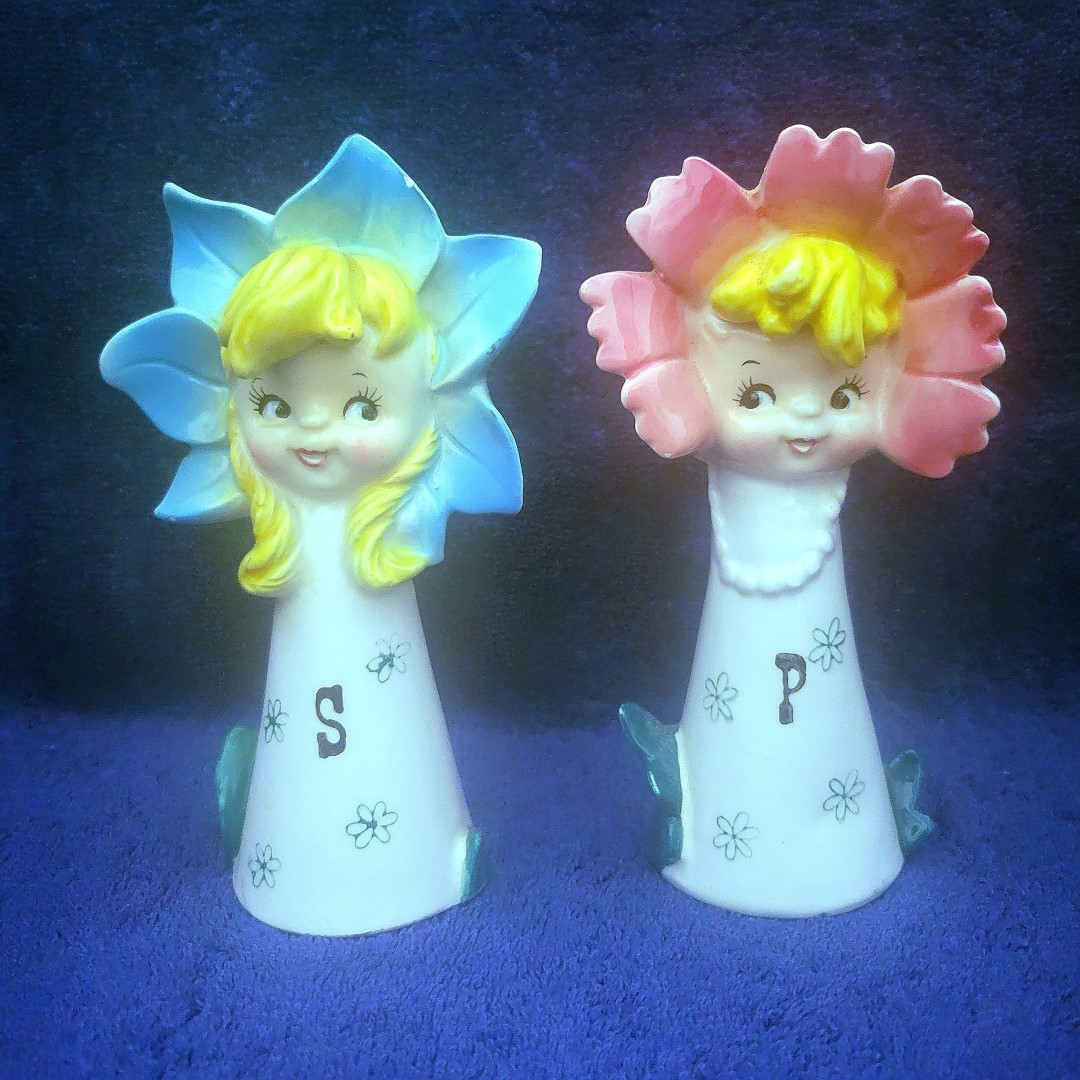 Salt & Pepper pairing with blue and pink flower bonnets.