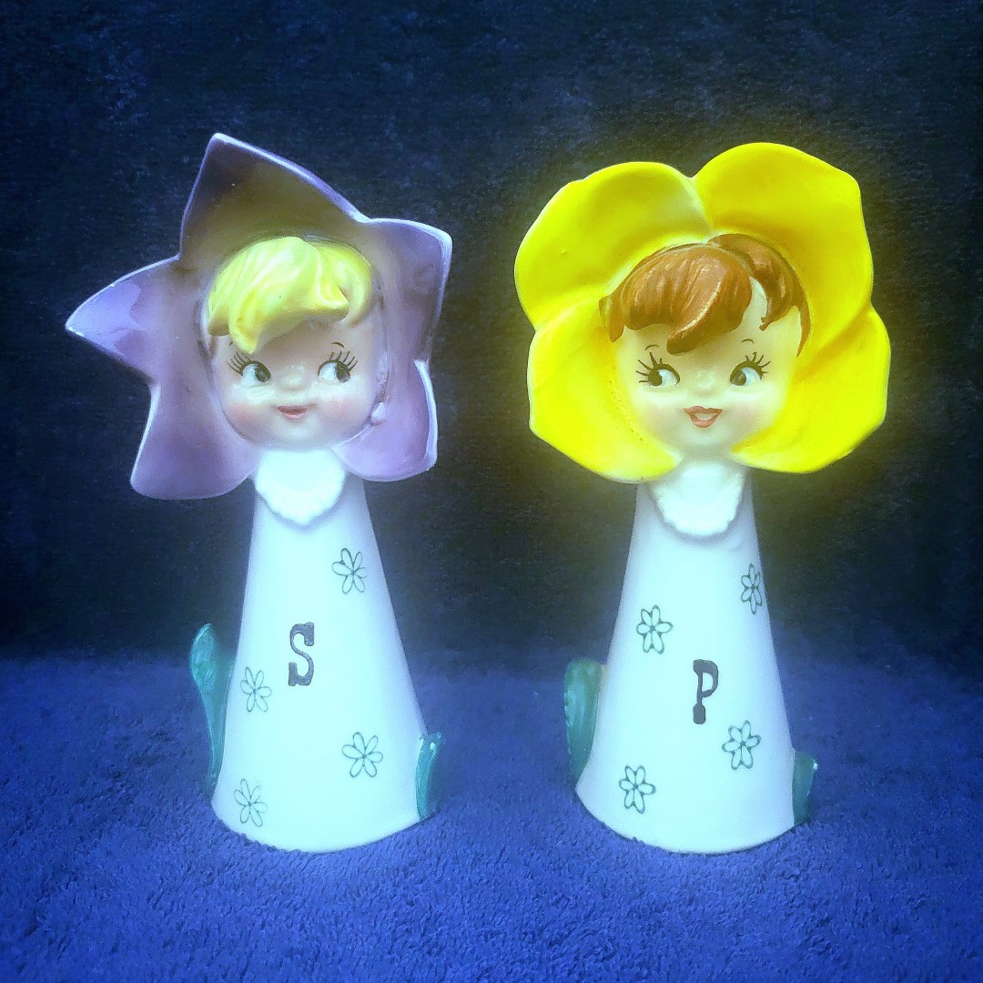Salt & Pepper pairing with purple and yellow flower bonnets.