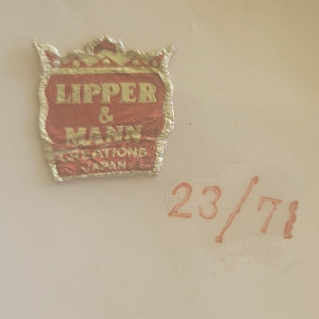 Lipper & Mann red-and-gold foil label and red ink mold-form number.