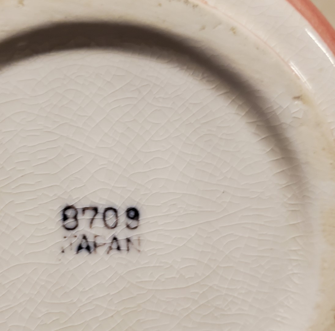 The inked backstamp clearly reads 8708 JAPAN.