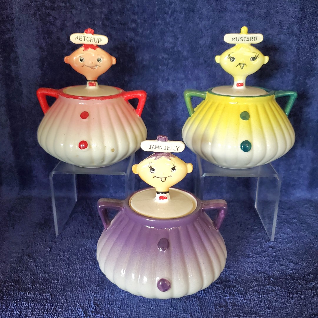 The Fading Trio Jars: Jam ’n Jelly, Mustard, and Ketchup.
