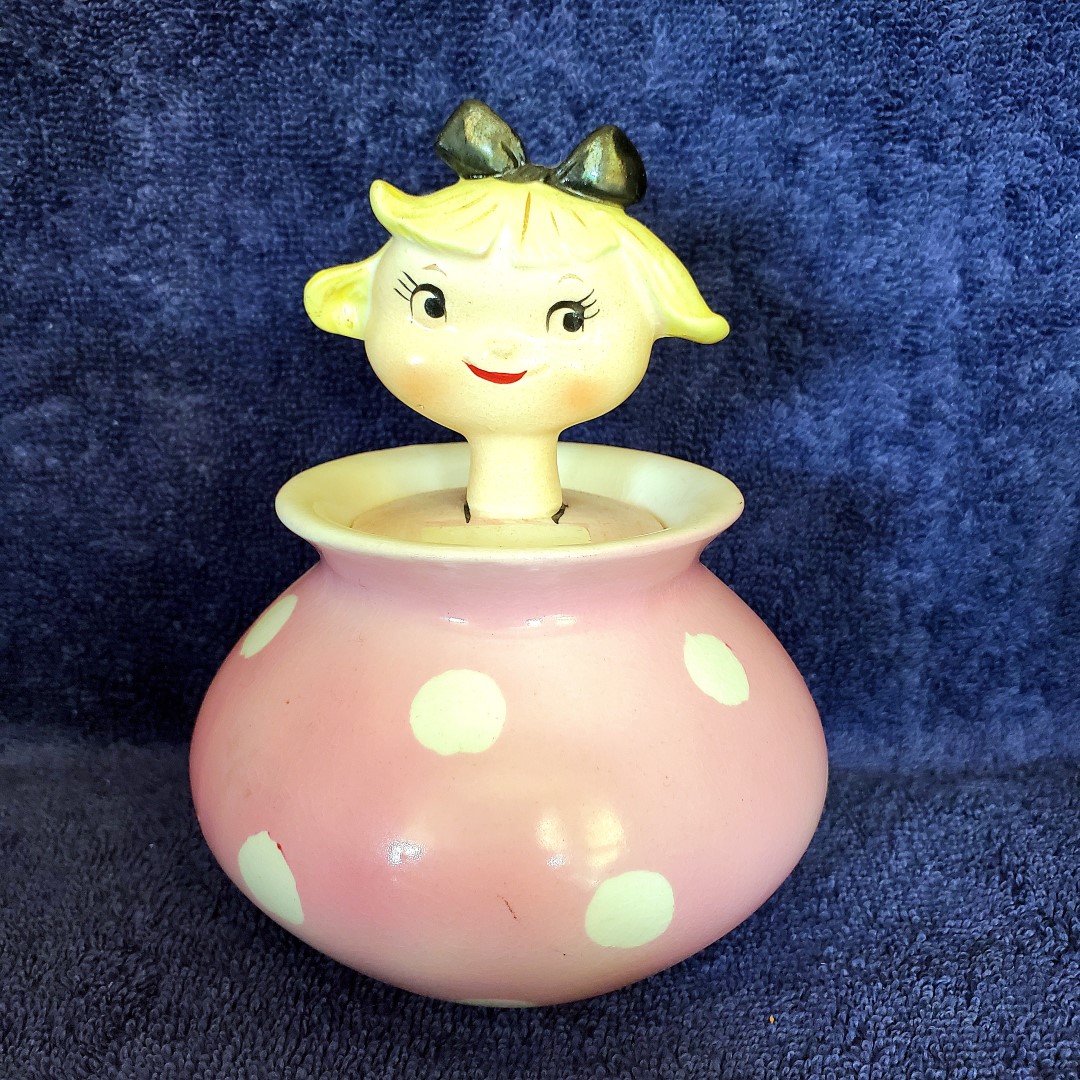 Girl jar with pink polka-dot body.