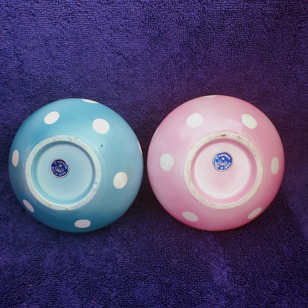 Round Empress Made in Japan labels on the undersides of the Boy and Girl jars.