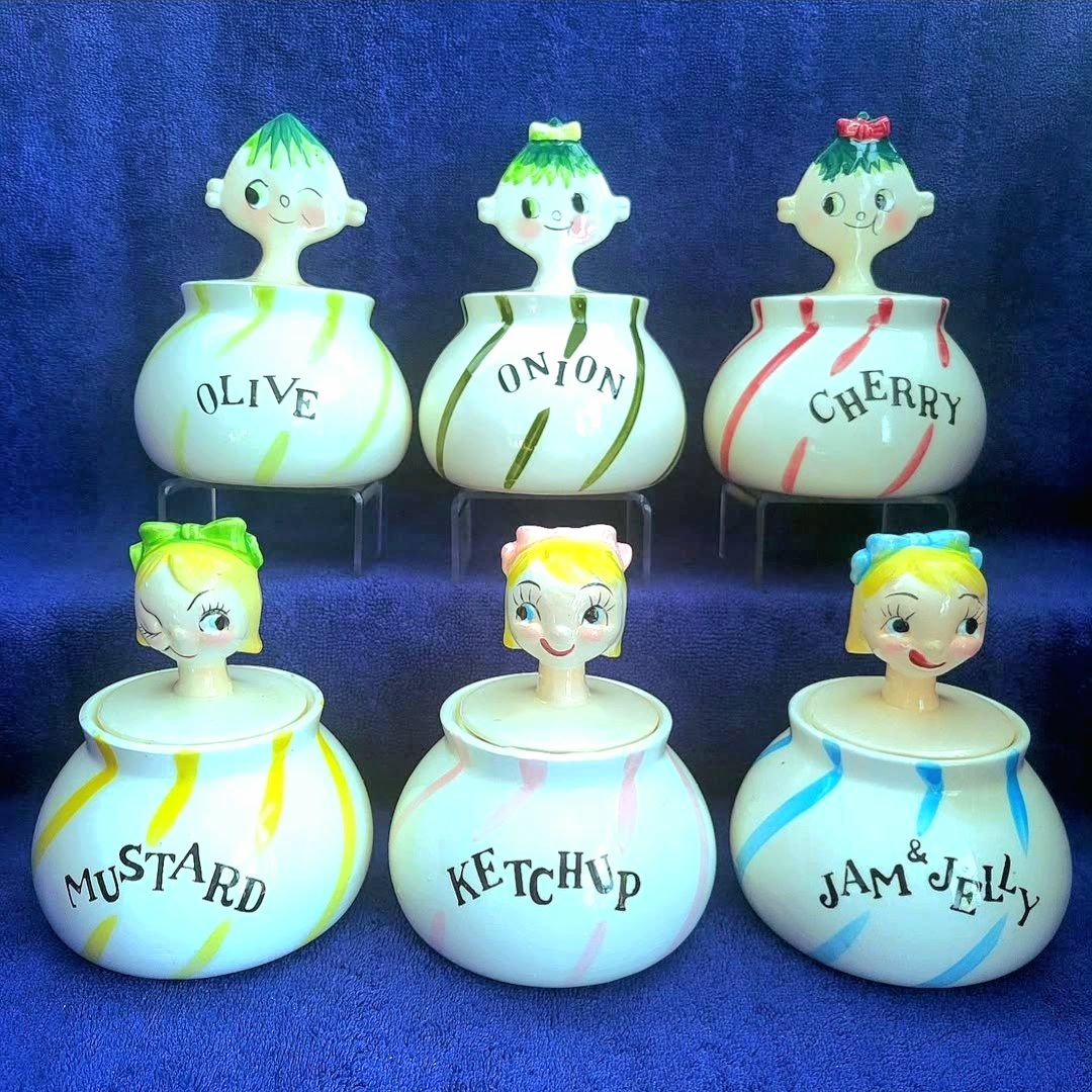 Complete Swirl Girls and Swirl Boy condiment jar group.