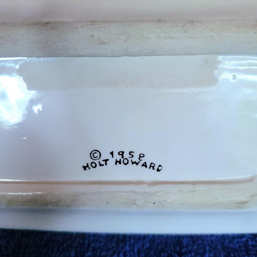 Close-up of the Holt-Howard 1959 mark on the butter dish