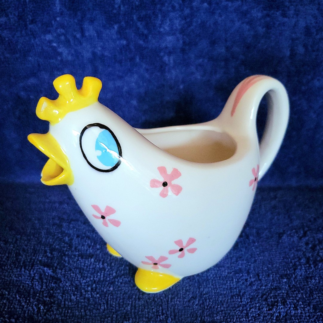 Close-up of the Peepin' Tom and Tweetie creamer