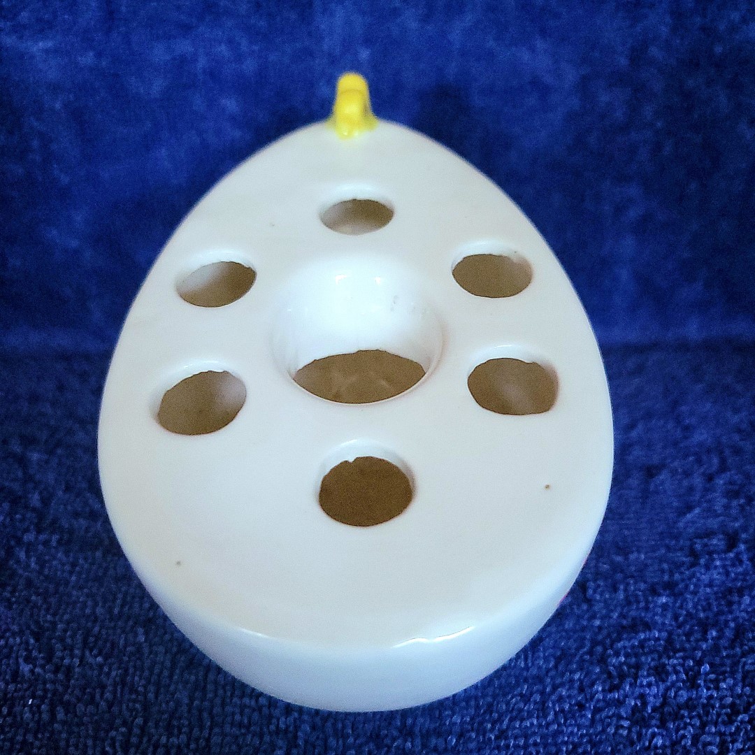 Top view showing the candle well and flower holes