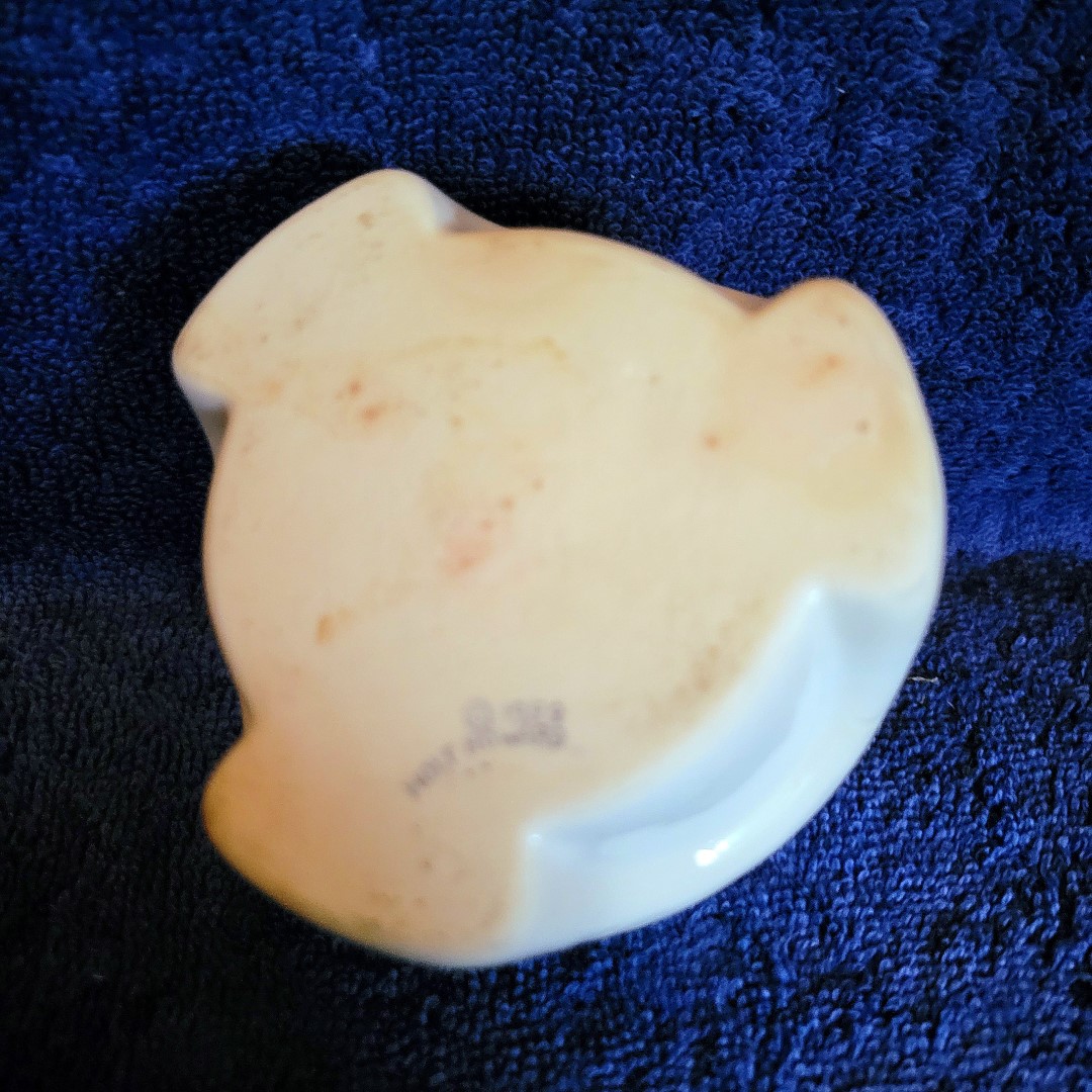 Underside of the sauce-warmer pedestal base