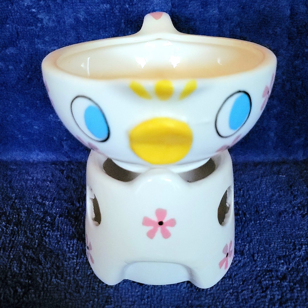 Front view of the Peepin' Tom and Tweetie sauce warmer