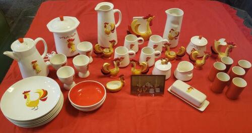 Broad grouping of Holt Howard Coq Rouge pieces.