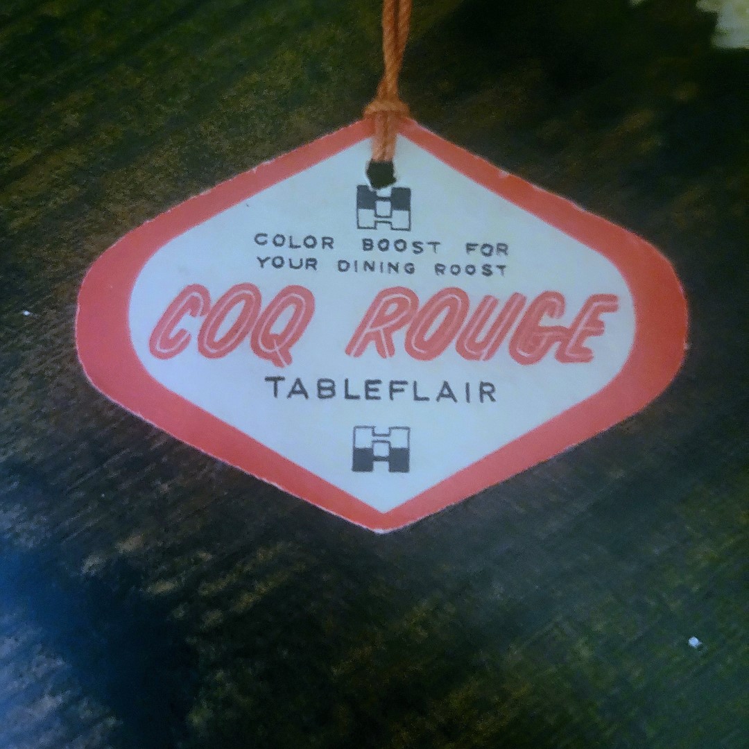 Original Holt Howard Coq Rouge paper hang tag.