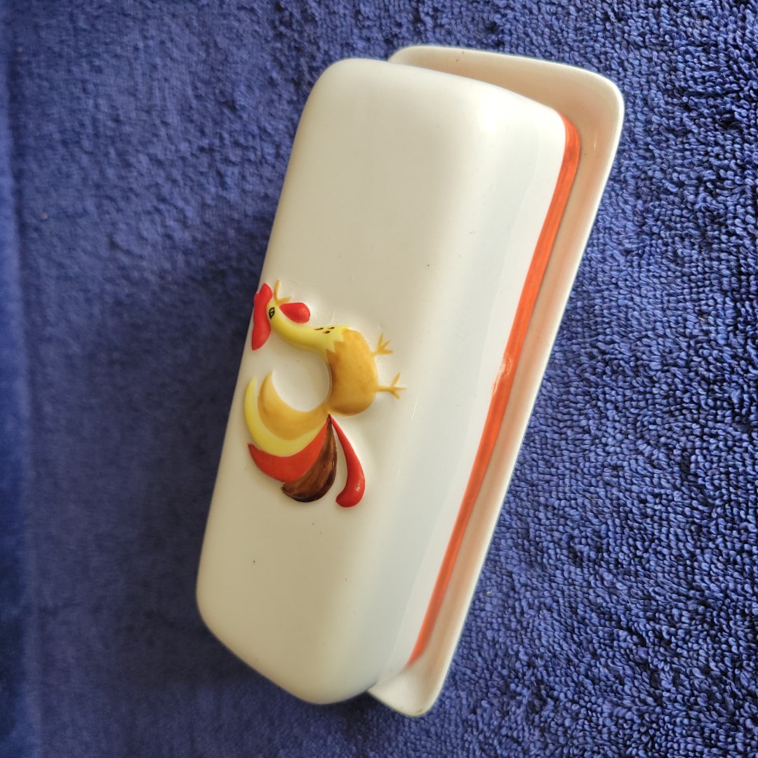 Coq Rouge butter dish with a full sculpted rooster on the lid.