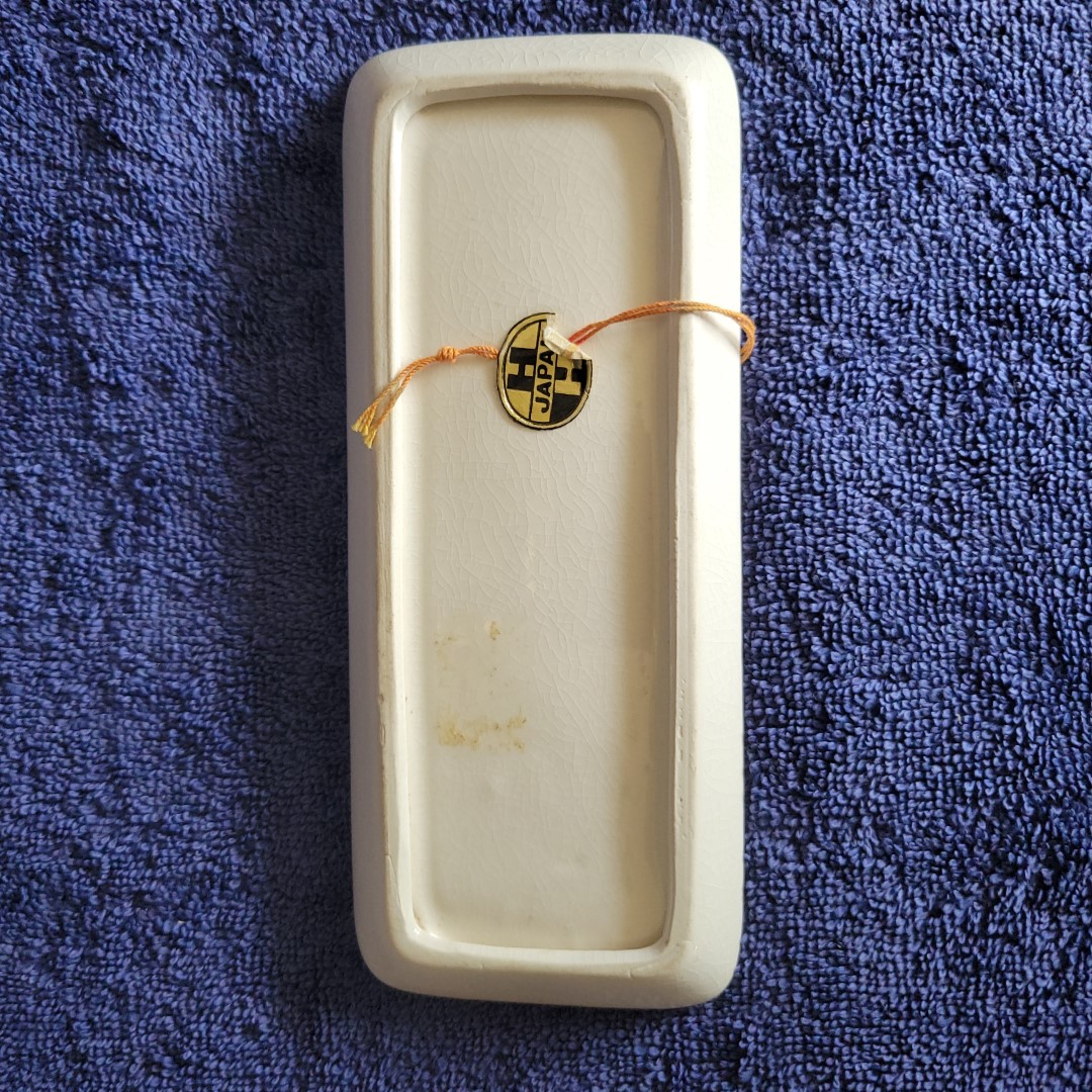 Underplate for the full-body Coq Rouge butter dish with original Holt Howard foil label.