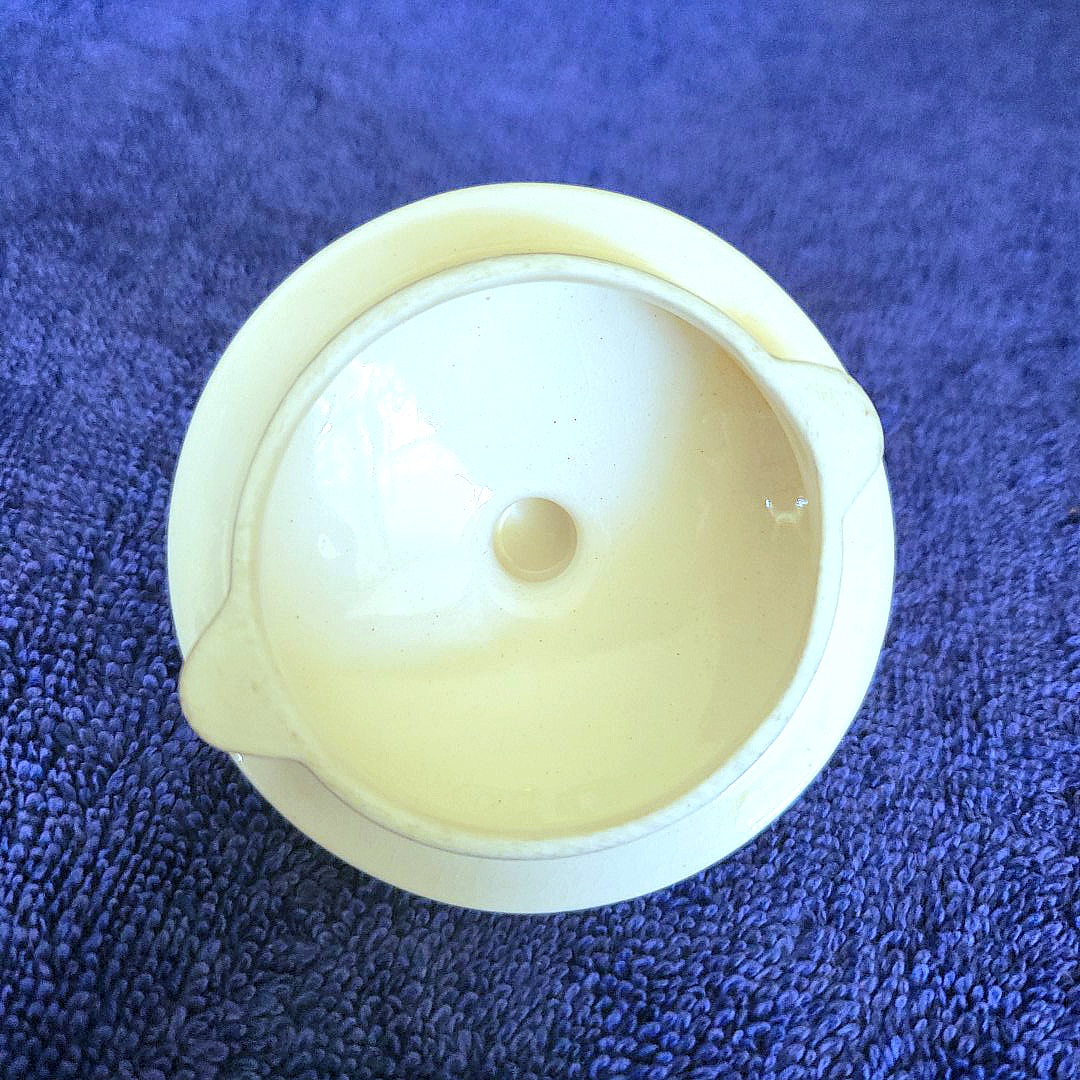 Underside of the notched lid for the Coq Rouge Coffee Server.