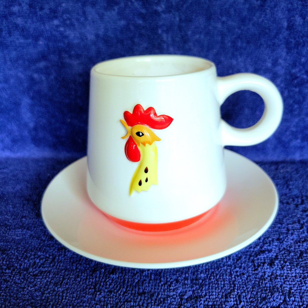 Early Holt Howard Coq Rouge tapered ring-handle coffee cup or mug with matching underplate.