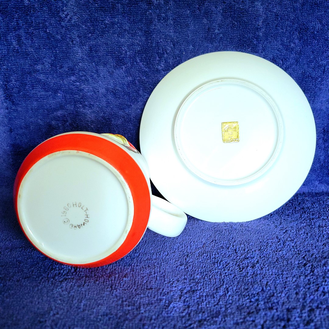 Underside and 1960 Holt Howard marking on the tapered Coq Rouge coffee cup or mug.