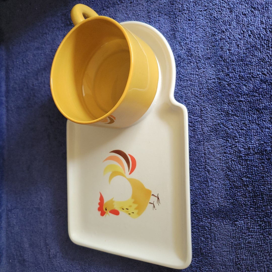 Holt Howard Coq Rouge snack dish with chicken soup mug seated in its circular recess.