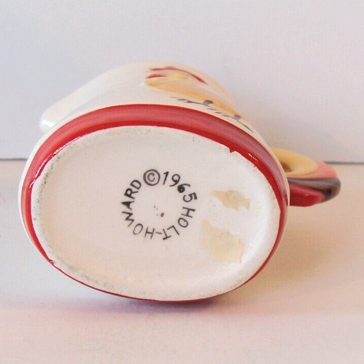 1964 Holt Howard backstamp on documented Coq Rouge syrup pitcher.