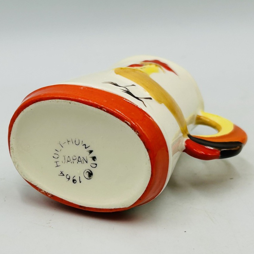 1965 Holt Howard backstamp on documented Coq Rouge syrup pitcher.