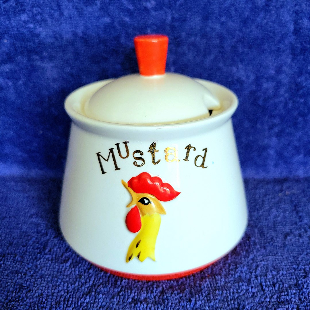 Holt Howard Coq Rouge Mustard condiment jar with rooster-head decoration.