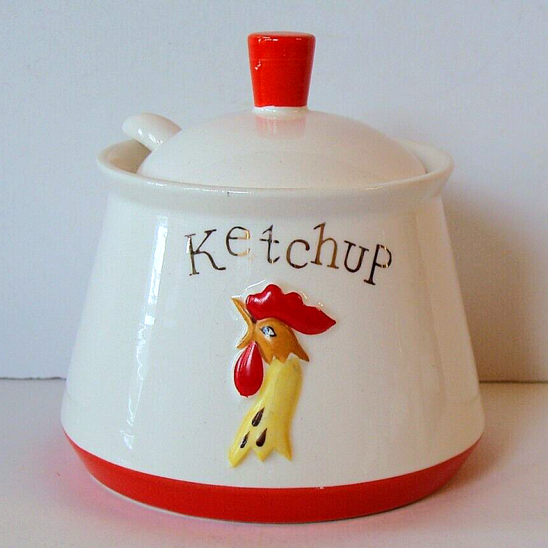Holt Howard Coq Rouge Ketchup condiment jar with rooster-head decoration.