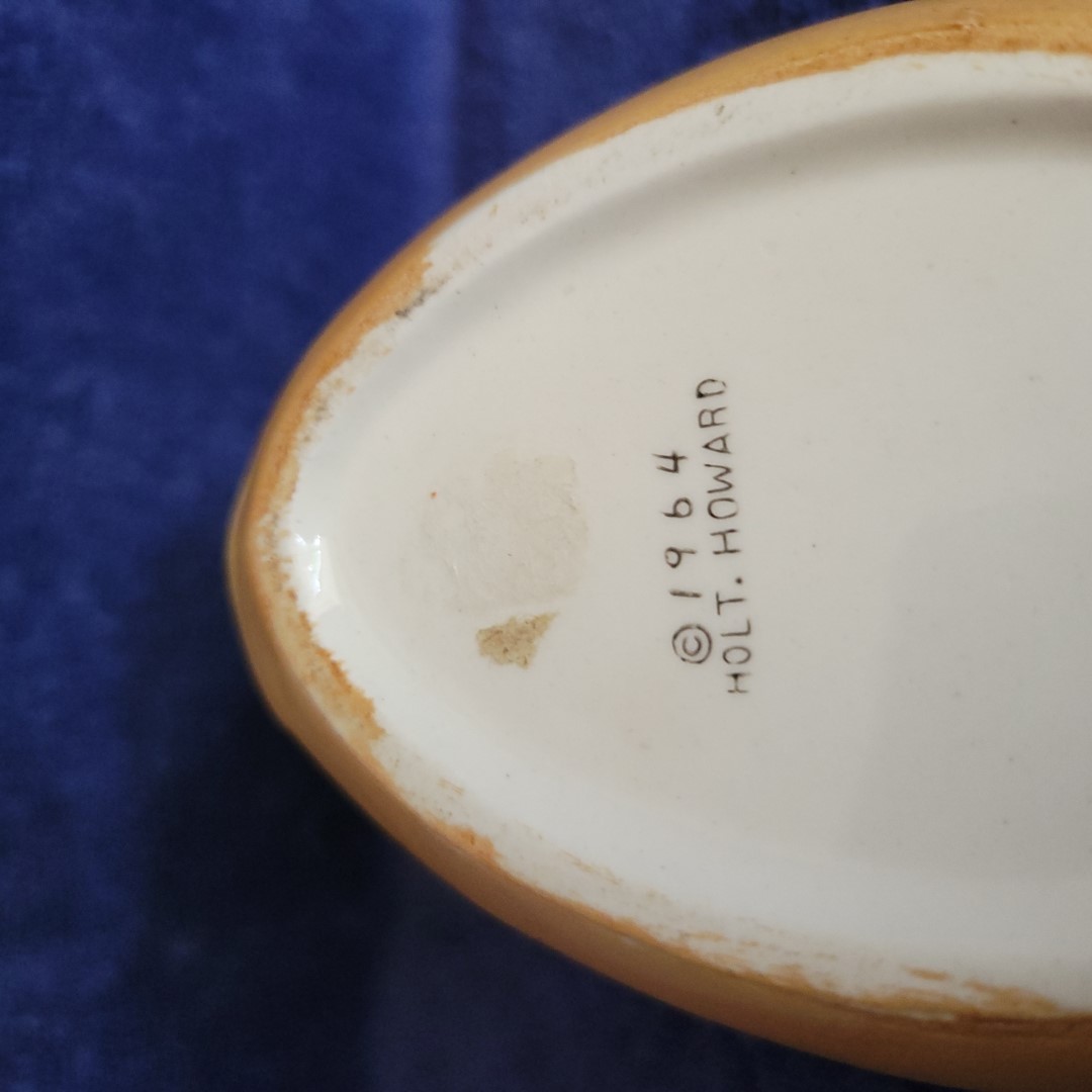 1964 Holt Howard backstamp on Coq Rouge spoon rest.