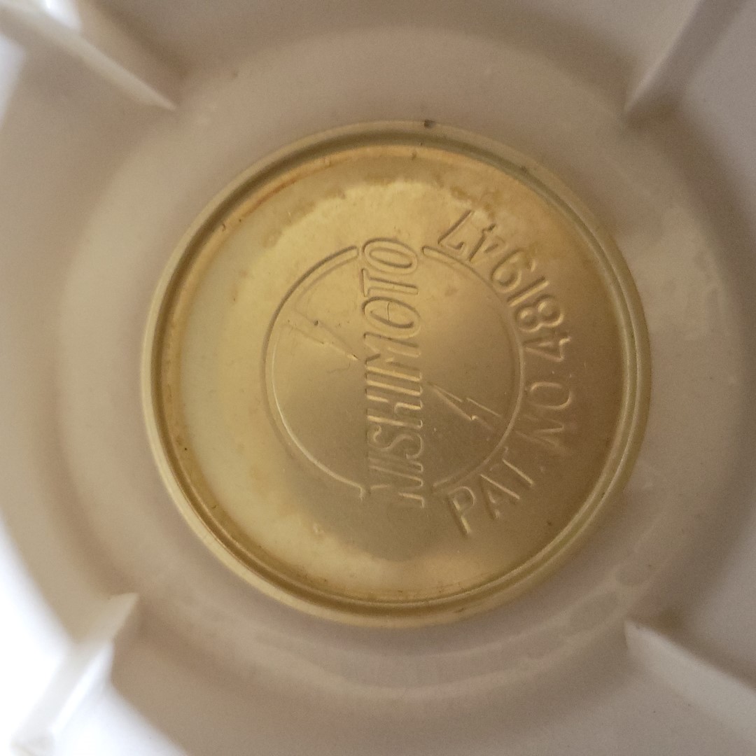 Washington Manufacturing marking on metal component inside Holt Howard Coq Rouge electric egg boiler.
