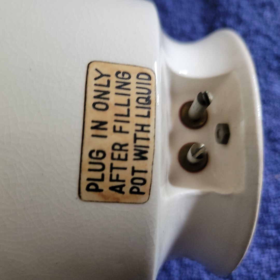 Instruction label on Holt Howard Coq Rouge electric egg boiler.