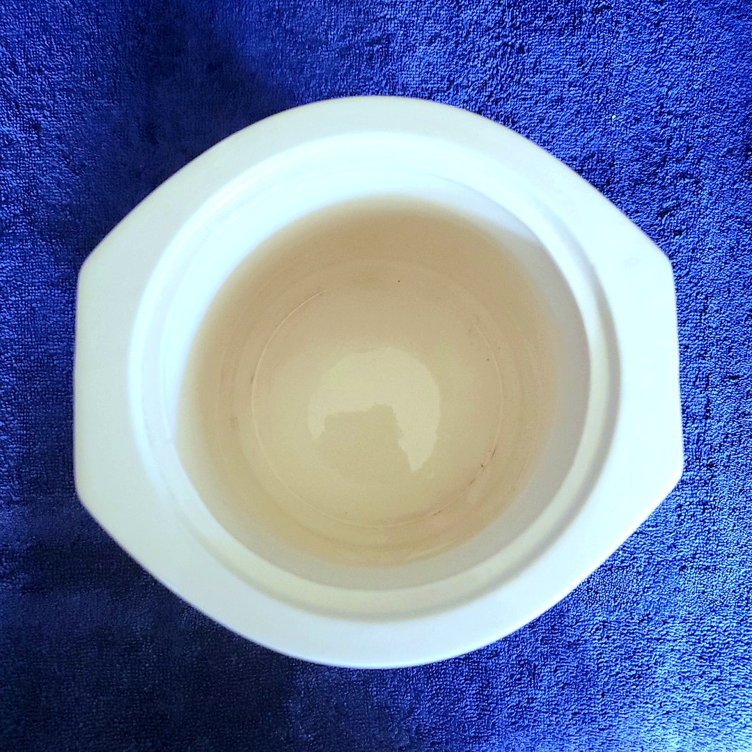 Interior of Holt Howard Coq Rouge cookie jar.