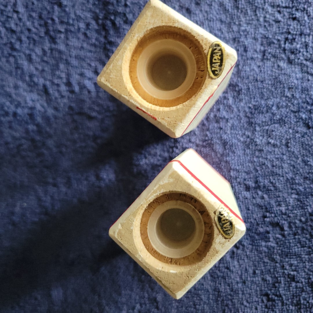 Bottom view of the Coq Rouge wooden salt and pepper shakers.
