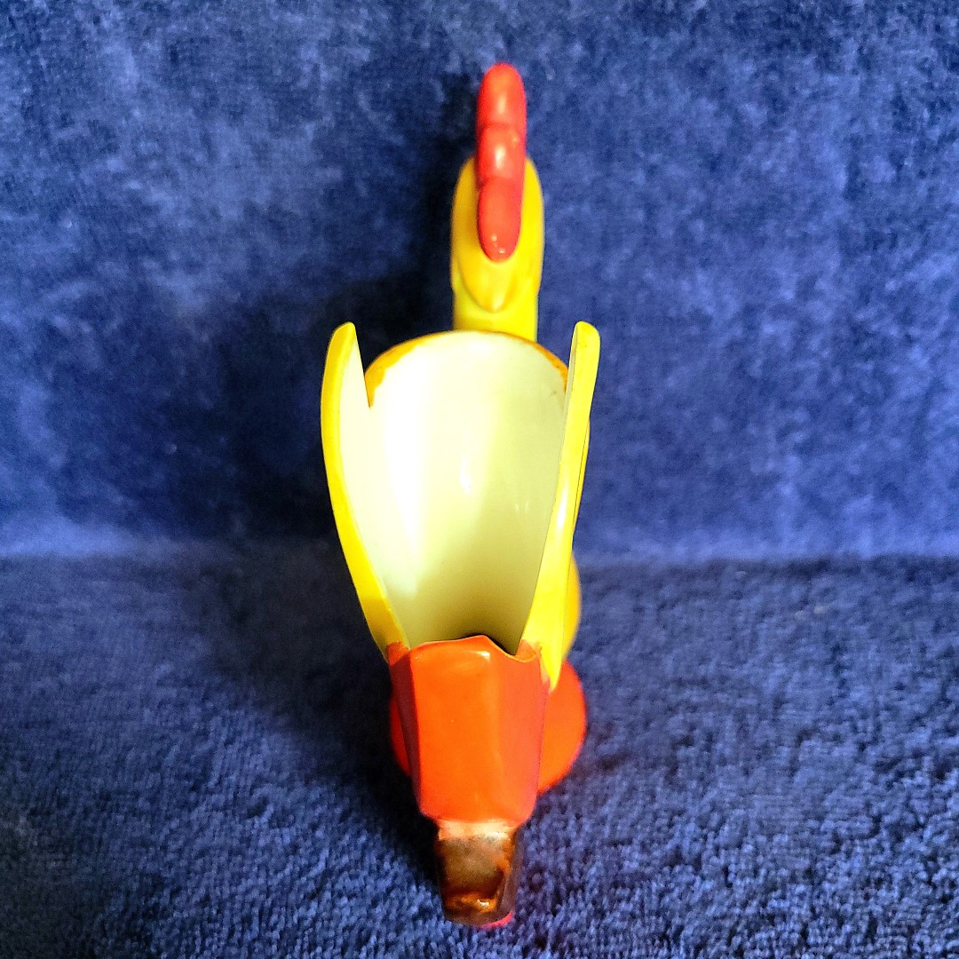 Rear view of the Holt Howard Coq Rouge bud vase showing the flower opening.