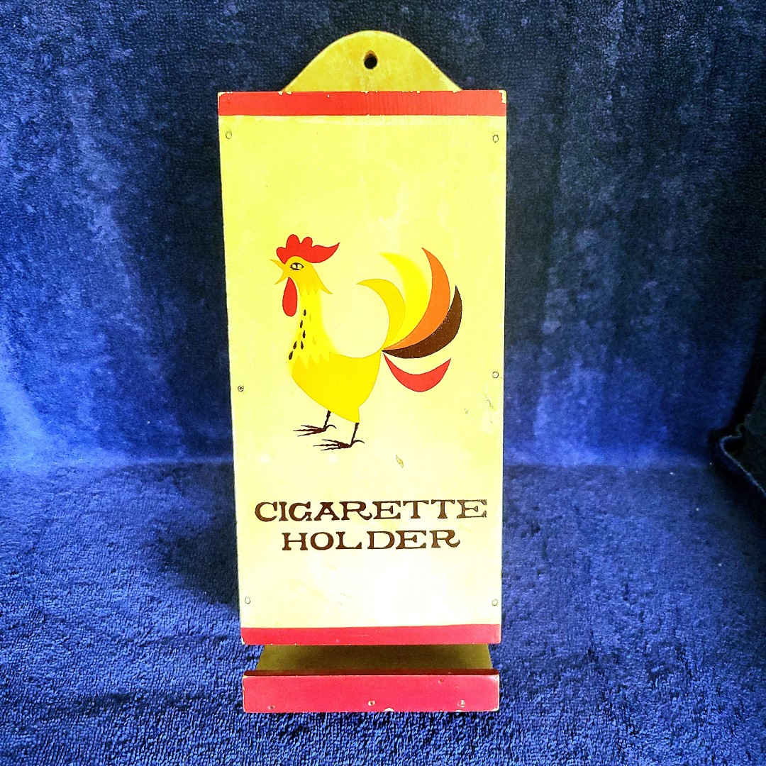 Front view of Holt Howard Coq Rouge cigarette package holder.