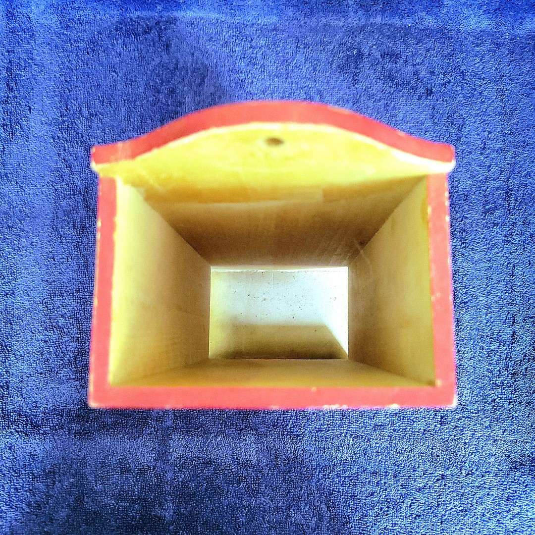 Interior view of Holt Howard Coq Rouge cigarette package holder.