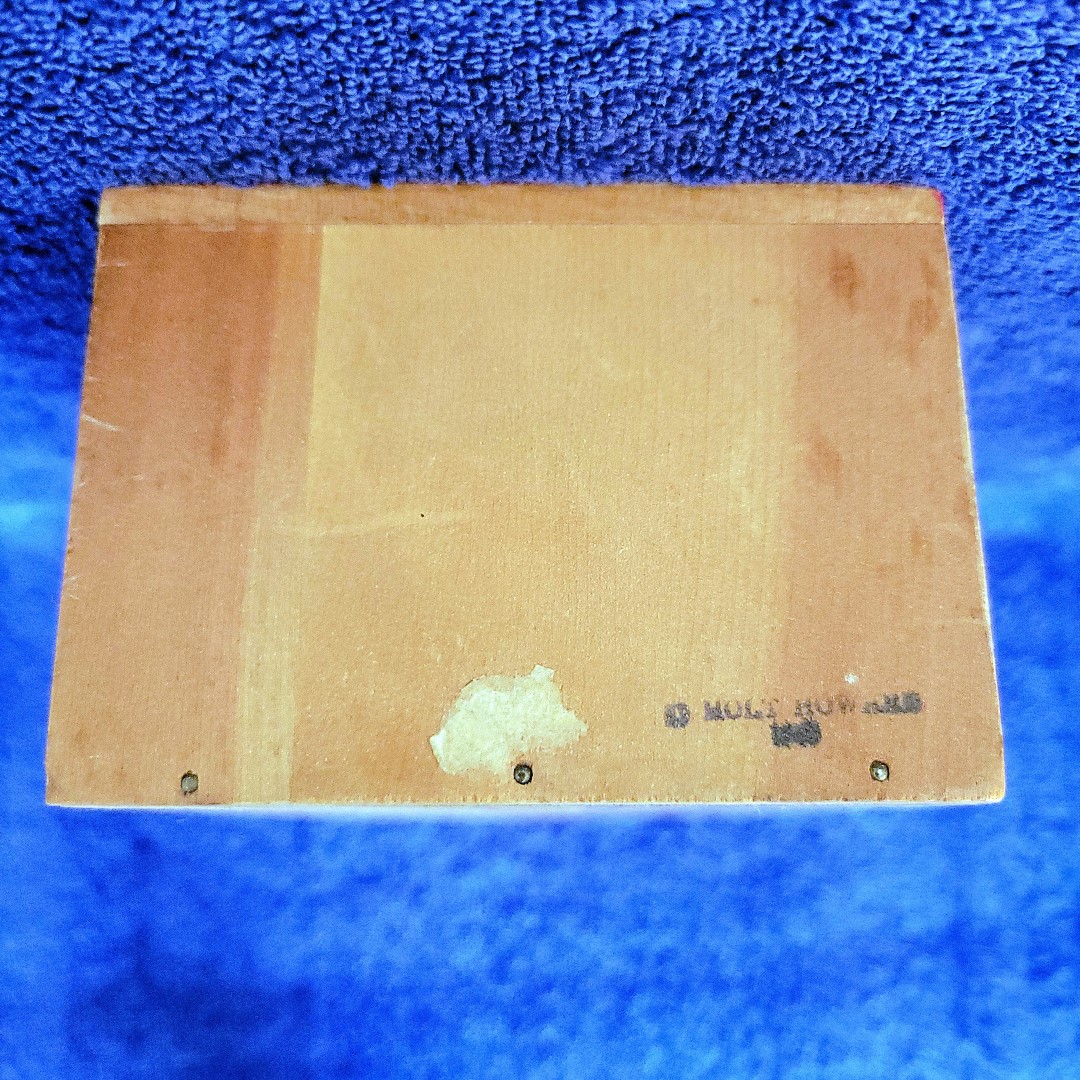 Rear view of Holt Howard Coq Rouge cigarette package holder.