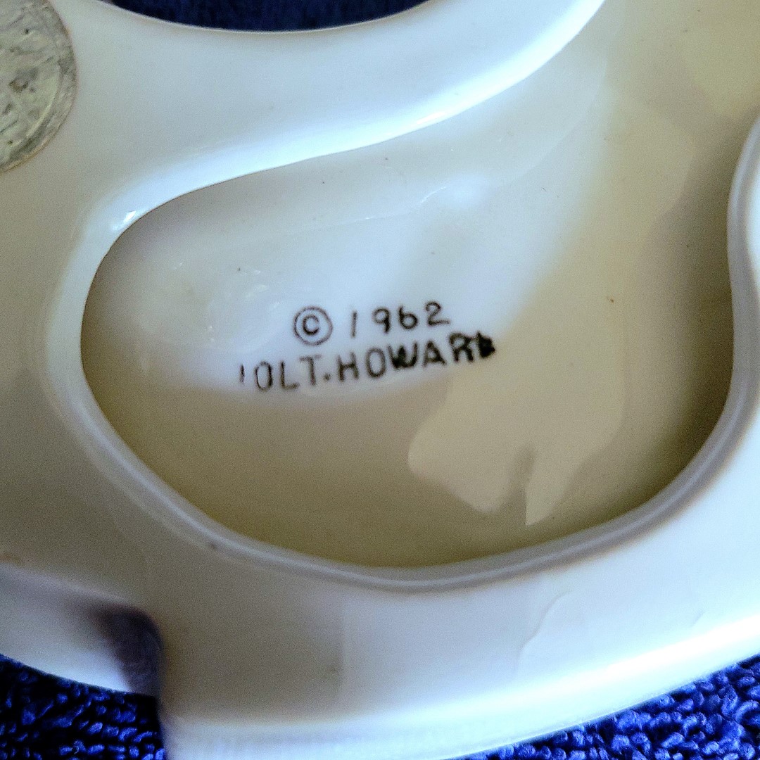 1962 backstamp on a large Holt Howard Coq Rouge nut dish.