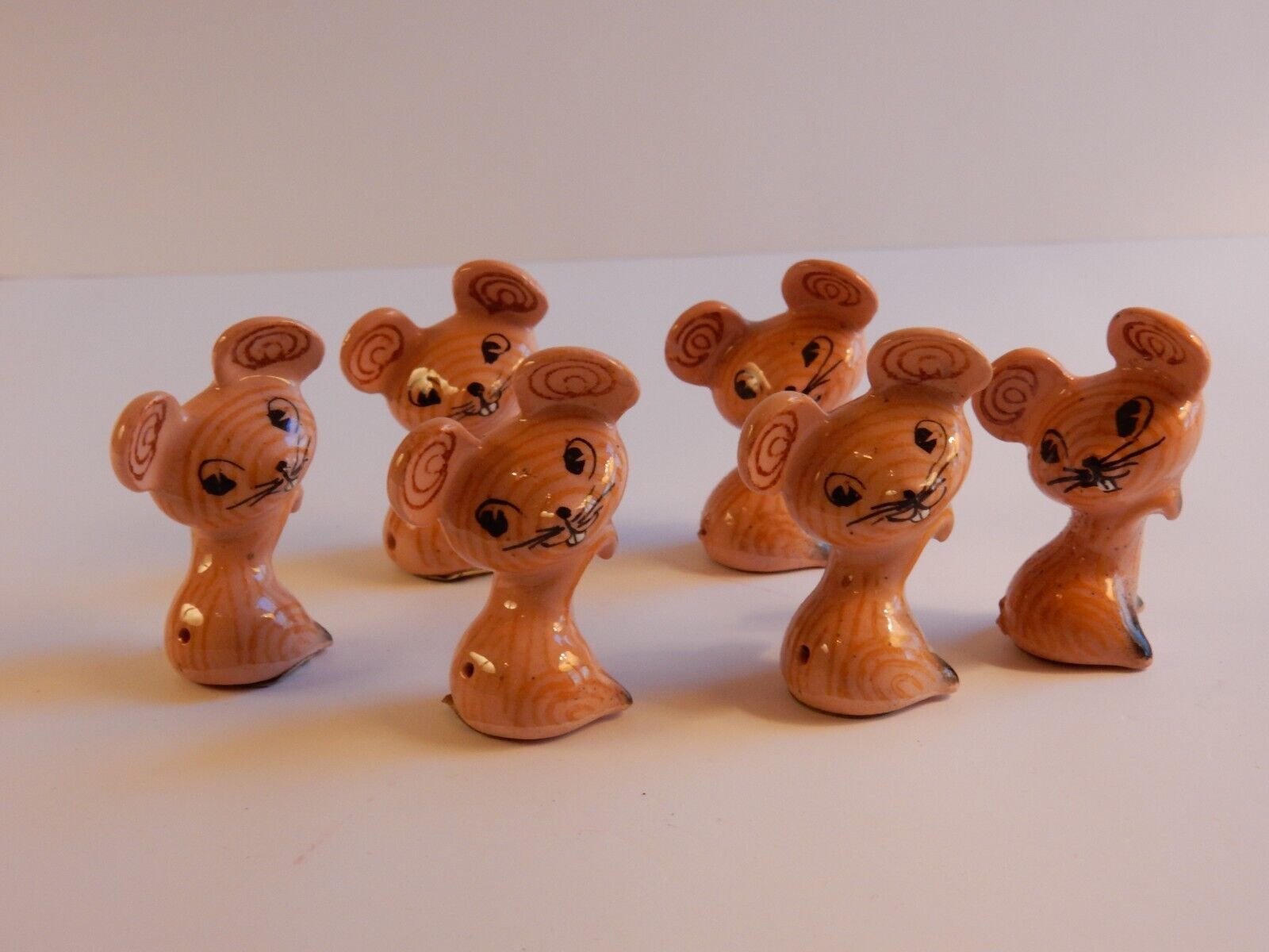 Six Merry Mouse Cocktail Kibitzers arranged together.
