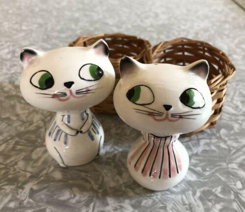 Cozy Kittens Peeking Cats salt and pepper shakers removed from their wicker baskets.