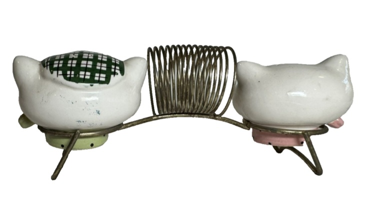 Rear view of Cozy Kittens napkin holder with salt and pepper shakers.
