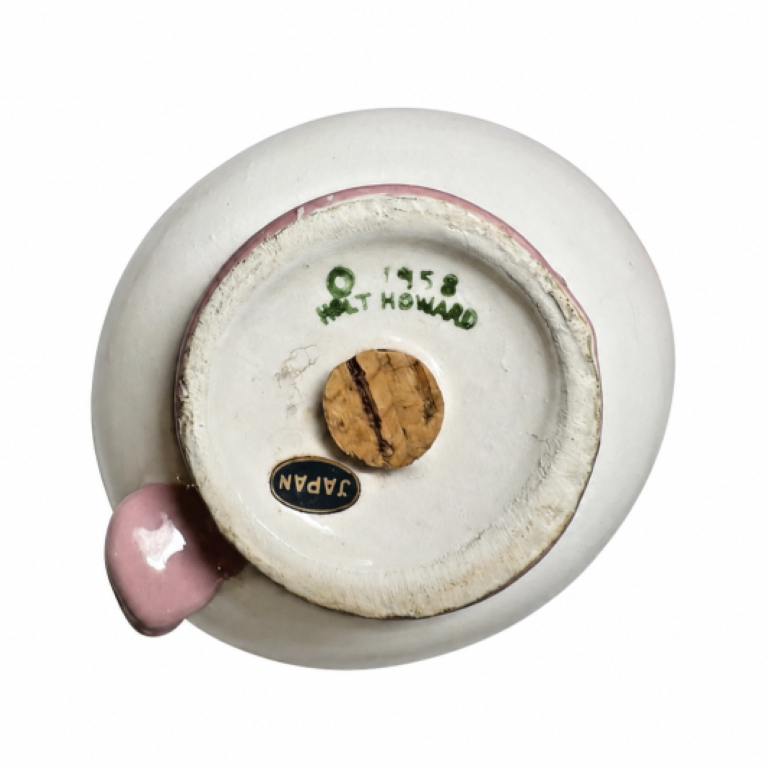 Underside of pink Cozy Kittens napkin holder shaker marked 1958 Holt-Howard.