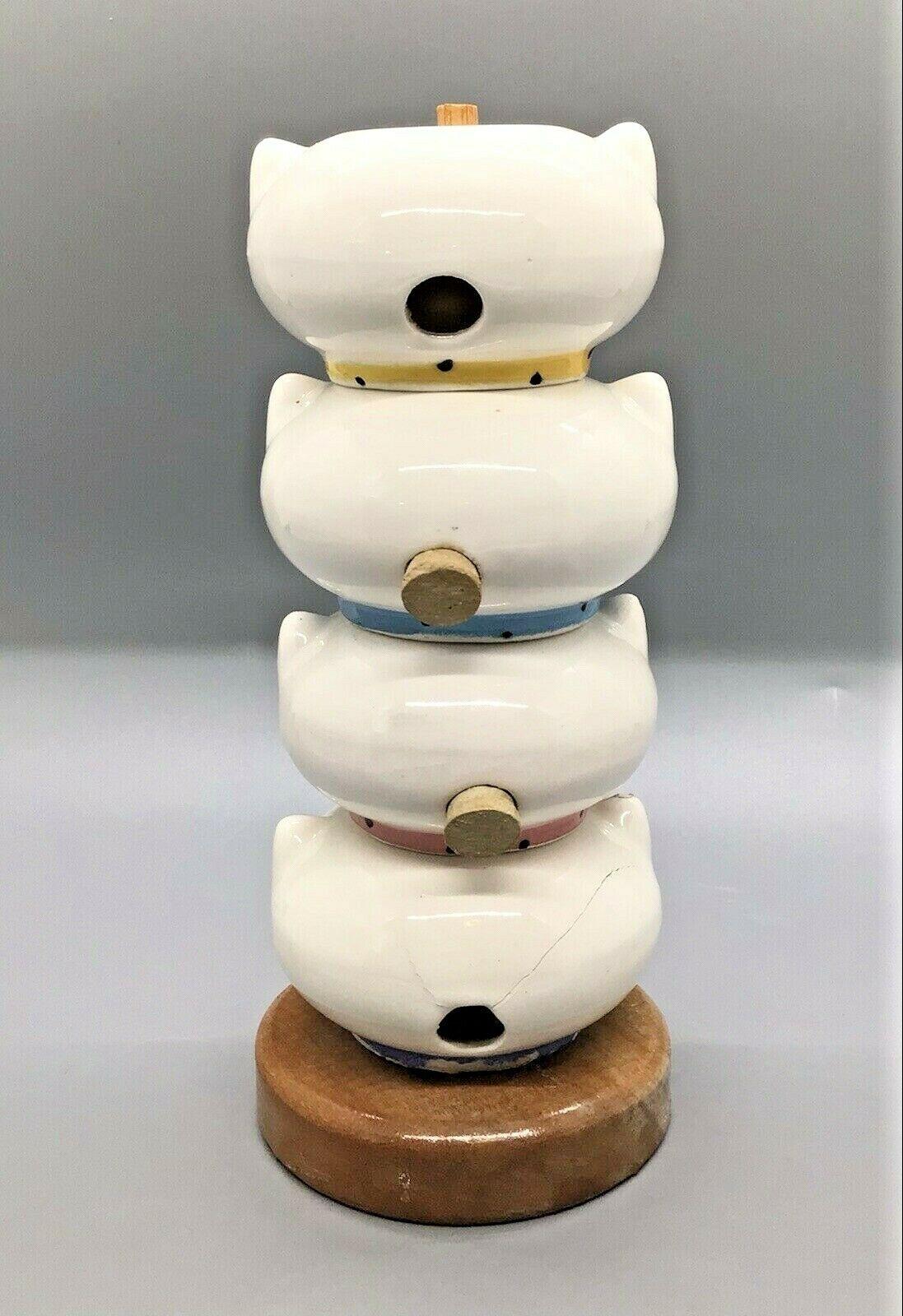 Rear view of Holt-Howard Cozy Kittens Stacking Seasons set.