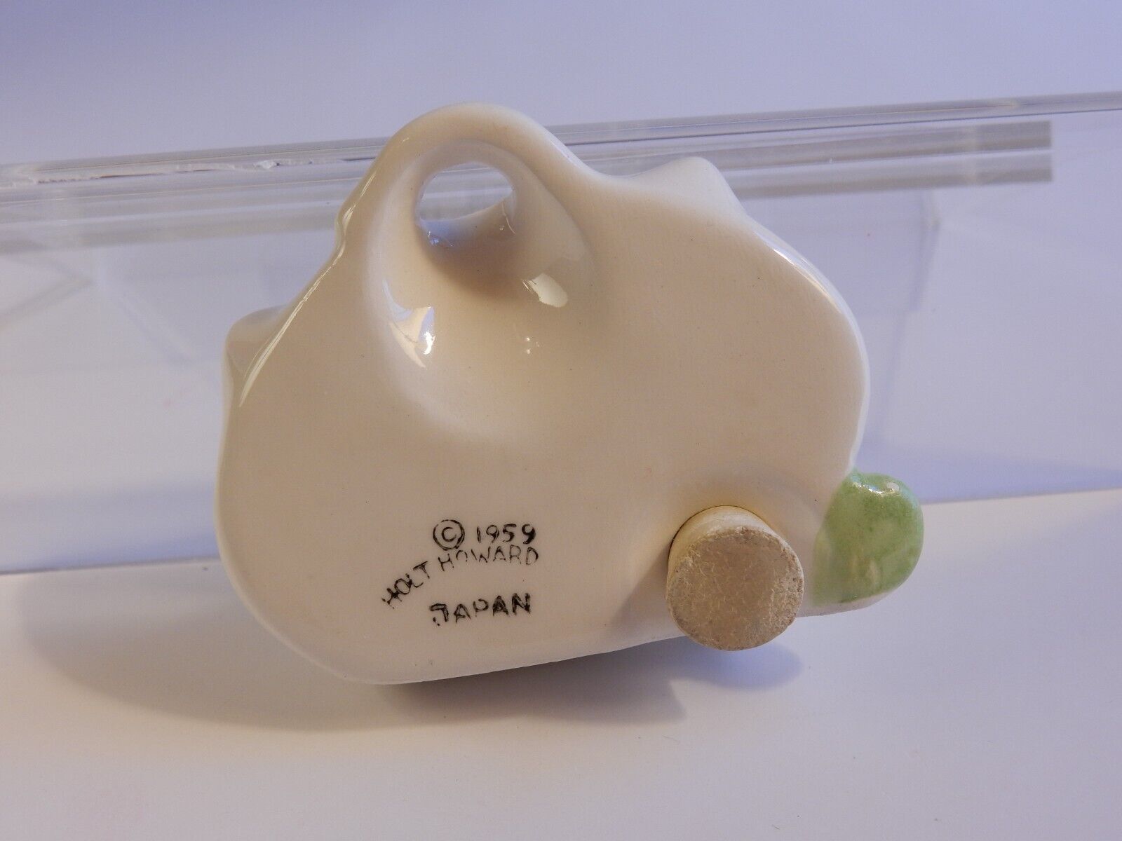 Rear detail of Cozy Kittens spice shaker marked 1959 Holt-Howard Japan.