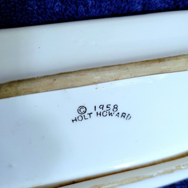 Close view of 1958 Holt-Howard mark on Cozy Kittens butter dish.