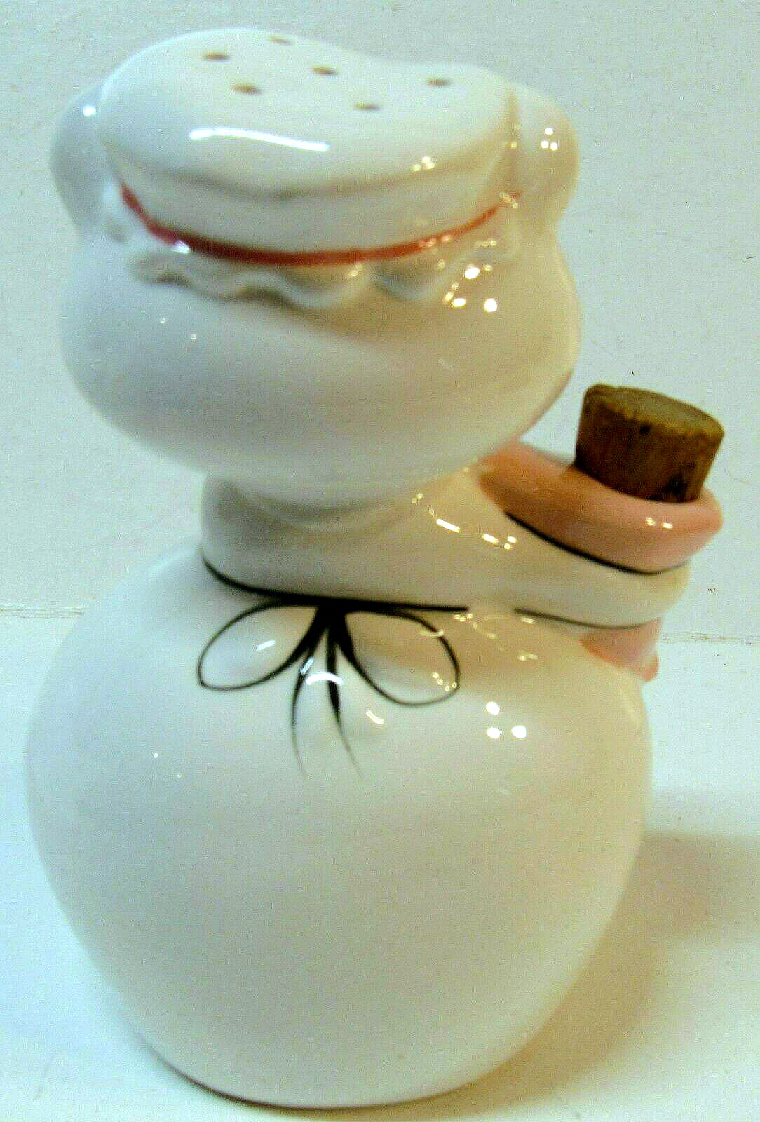 Side and rear view of Cozy Kittens sugar shaker showing head holes and sugar sack cork.