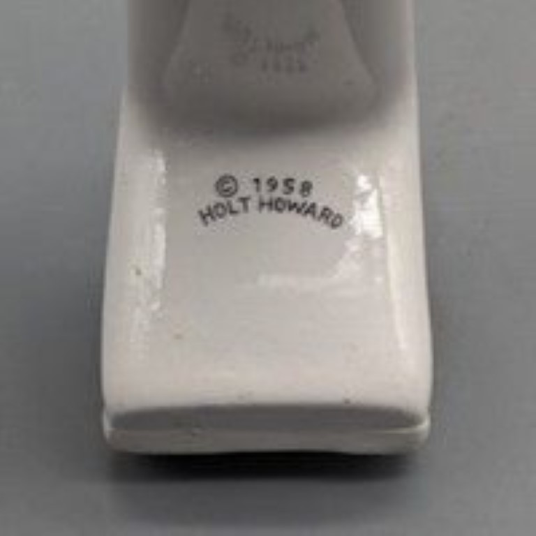 Backstamp on Cozy Kittens spoon rest marked 1958 Holt-Howard.