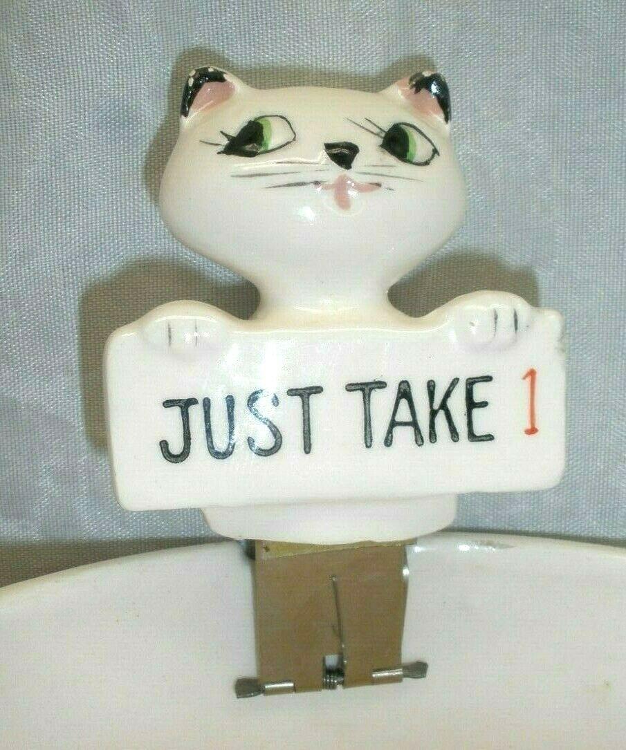 Close view of Cozy Kittens Pop-Up Cookie Jar kitten holding Just Take 1 sign.